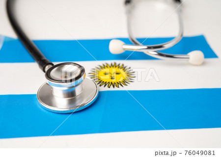 Black stethoscope on Argentina flag background, Business and finance concept. 76049081