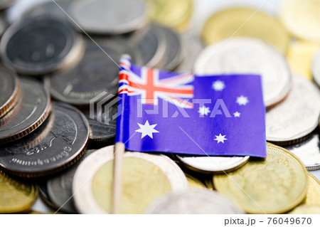 Australia Flag on coins background 76049670