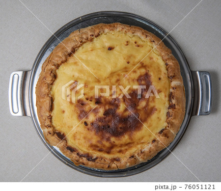 Parisian Flan, cutted classic tart served on a plate copy space Parisian Flan, cutted classic tart served on a plate copy space 76051121