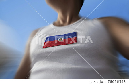 The national flag of Haiti on the athlete's chest 76056543
