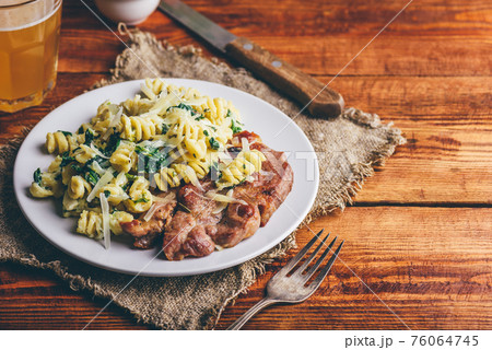 Pork Neck Steak with Creamy Spinach Pasta 76064745