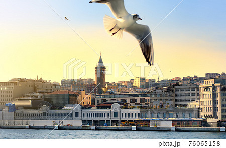 Aerial view of Beyoglu district with old houses and Galata Tower on top in Istanbul, Turkey.  76065158