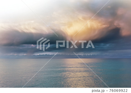 Beautiful clouds over sea. 76069922