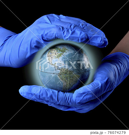 Planet earth in the palms, palms in medical gloves, a healthy planet full of energy, virus, coronovirus, covid-19 pandemic, close-up copy space on a black background Planet earth in the palms, palms in medical gloves, a healthy planet full of energy, virus, coronovirus, covid-19 pandemic, close-up copy space on a black background 76074279
