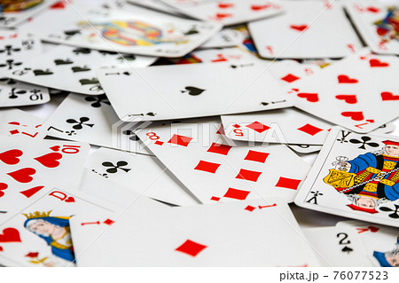 Classic playing card game laid out on a table 76077523