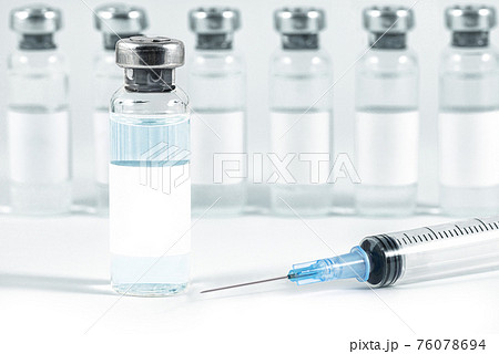 Close-up of shingle vaccine vial and syringe 76078694