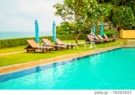 chair pool and umbrella around swimming pool chair pool and umbrella around swimming pool 76085683