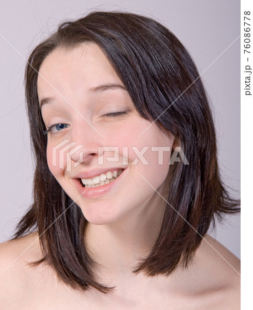 The portrait of The blinking girl 76086778