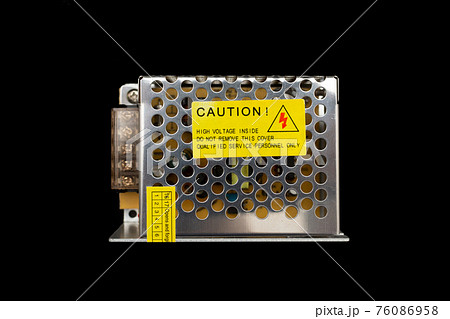 Power supply for LED strip on a black background. Power supply for LED strip on a black background. 76086958