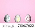 Fracturing and peeling easter egg. Yellow, red, and turquoise. 3d illustration 76087022