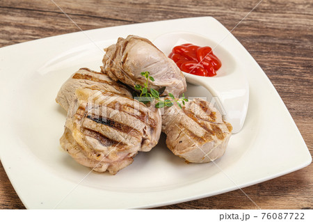 Grilled pork tenderlion with tomato sauce Grilled pork tenderlion with tomato sauce 76087722