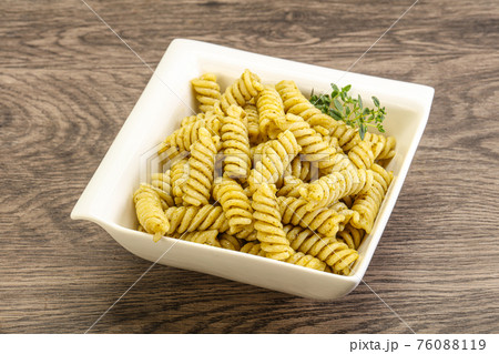 Italian pasta Fusilli with pesto 76088119