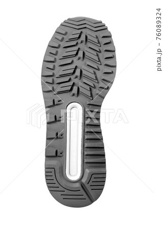 Gray sole of a boot on a white background 76089324