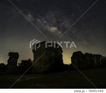 The Milky Way over the rocks in Phu Lan Kha National Park, Chaiyaphum Province, Thailand 76091449