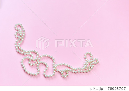 Feminine desktop mockup with pearls on pink background with copy space. Feminine desktop mockup with pearls on pink background with copy space. 76093707
