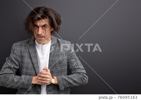 angry man preparing fist, irritated by something 76095163