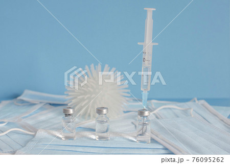 Conceptual photo for worldwide pandemic vaccination, beginning of mass vaccination for coronavirus COVID-19, influenza or flu, world immunization. Selective focus Conceptual photo for worldwide pandemic vaccination, beginning of mass vaccination for coronavirus COVID-19, influenza or flu, world immunization. Selective focus 76095262