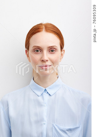 Young Smiling Woman Isolated On White Studio Background Young Smiling Woman Isolated On White Studio Background 76095309