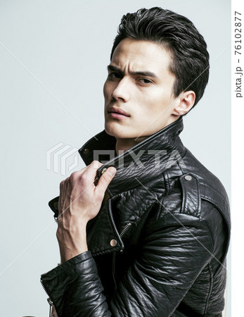 young handsome asian man, leather jacked on naked torso, emotional posing, lifestyle people concept young handsome asian man, leather jacked on naked torso, emotional posing, lifestyle people concept 76102877