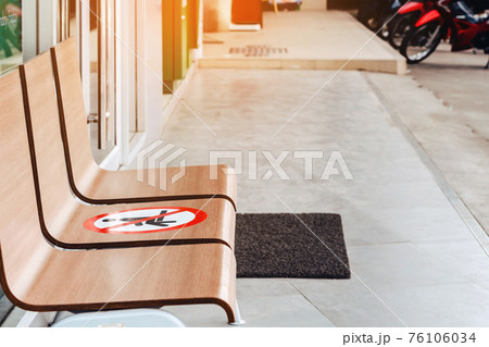 Alternative seating mark for social distance rules in front of the bank distance for one seat from other people to protect from Corona Virus(COVID-19), Social distancing for infection risk. Alternative seating mark for social distance rules in front of the bank distance for one seat from other people to protect from Corona Virus(COVID-19), Social distancing for infection risk. 76106034
