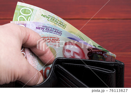 New Zealand money in the black wallet New Zealand money in the black wallet 76113627