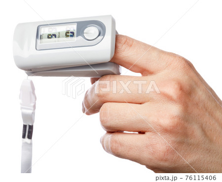 Person using pulse oximeter to check oxygen saturation tracking coronavirus symptoms at home 76115406