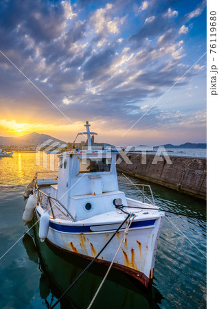 Fishing boat in port of Naousa on sunset. Paros lsland, Greece 76119680