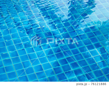 Background of rippled water in swimming pool. Background of rippled water in swimming pool. 76121886