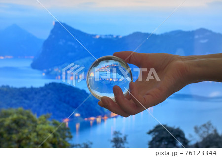 A Glass Lens ball and Lake Lucerne in Horw 76123344