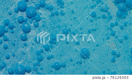 Bright neon blue bubbles oil and ink, acrylic paint moving close-up, wallpaper background 76126303