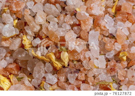 Close up background texture of crystals pink himalayan salt with spices Close up background texture of crystals pink himalayan salt with spices 76127872