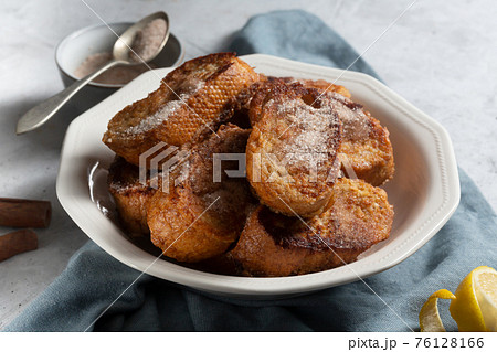 Traditional Spanish torrijas. Dessert for Christmas time or Pascua in Spain Traditional Spanish torrijas. Dessert for Christmas time or Pascua in Spain 76128166
