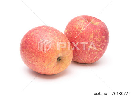 Fuji apples isolated on white background. Healthy food concept Fuji apples isolated on white background. Healthy food concept 76130722