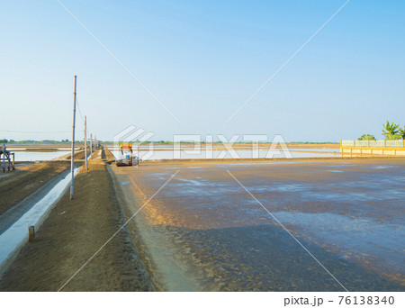 Natural sea salt ponds. Farm field outdoor. Material in traditional industry in Thailand. Asia culture. Agriculture. 76138340