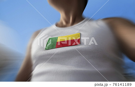 The national flag of Benin on the athlete's chest 76141189