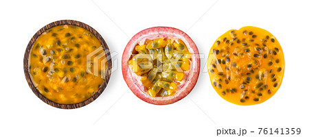 passion fruit in wood bowl isolated on white background 76141359