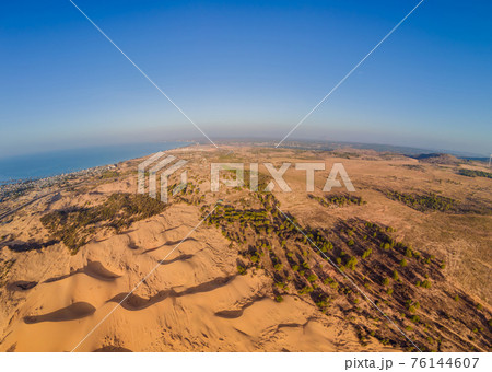 Desert - Global Warming. Huge dunes of the desert. Fine place for photographers and travelers. Beautiful structures of sandy barkhans 76144607