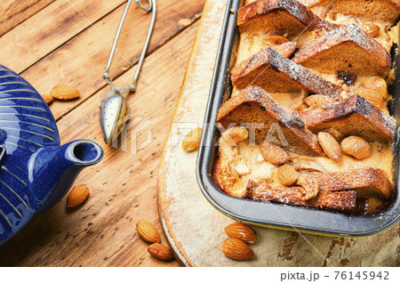 Breakfast in the style of French toast on wooden table Breakfast in the style of French toast on wooden table 76145942