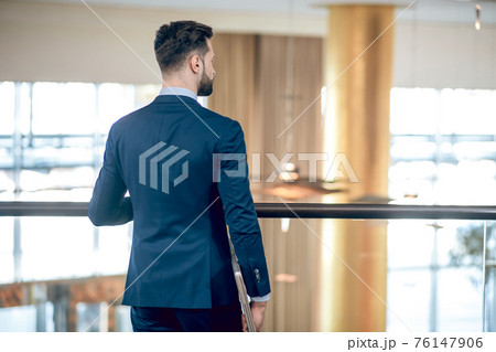 Elegant businessman in a nice suit in the office 76147906