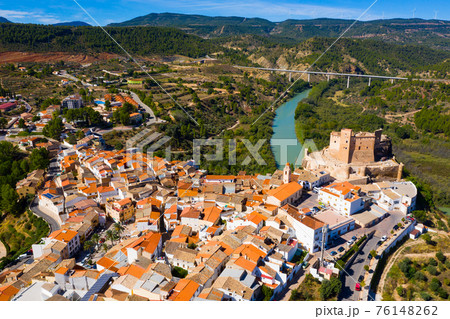 View from drone of Cofrentes cityscape with castle, Valencia, Spain View from drone of Cofrentes cityscape with castle, Valencia, Spain 76148262