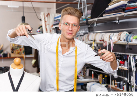 Portrait of happy blond male tailor Portrait of happy blond male tailor 76149056