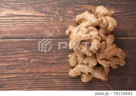 top view of Gingers on wooden table with copy space  76150691