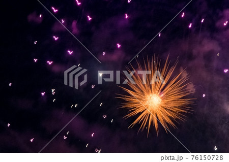 Orange big bang science object with glowing core 76150728