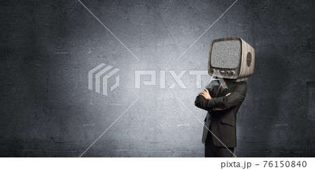 Businessman with old TV instead of head. Businessman with old TV instead of head. 76150840