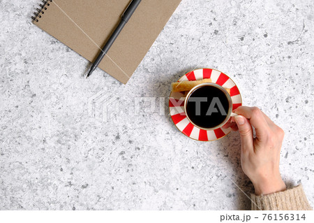 Coffee in a cup, cookies and notepad 76156314