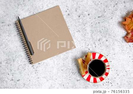 Coffee in a cup, cookies and notepad Coffee in a cup, cookies and notepad 76156335