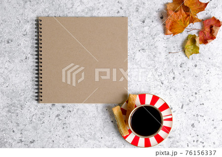 Coffee in a cup, cookies and notepad Coffee in a cup, cookies and notepad 76156337
