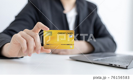 Online product purchase, Businesswoman use laptop register via credit cards to make online purchases, Shopping and mail, credit card online security, Online shopping concept. Online product purchase, Businesswoman use laptop register via credit cards to make online purchases, Shopping and mail, credit card online security, Online shopping concept. 76156583