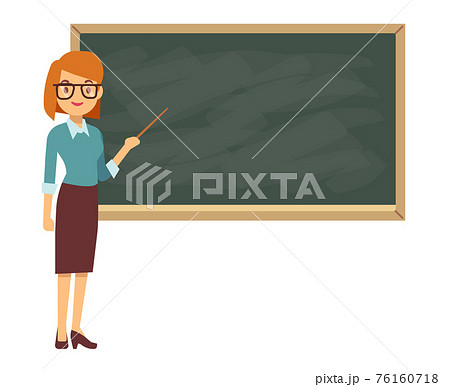 Young female teacher on lesson at blackboard in classroom 76160718