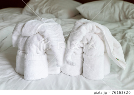 couple of figures from a towel an elephant greeting at a hotel in thailand couple of figures from a towel an elephant greeting at a hotel in thailand 76163320